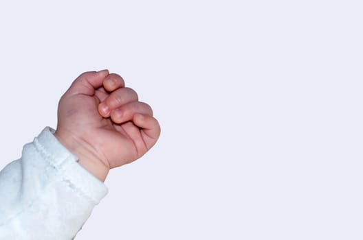 Baby hand fingers against white Hintergurnd.