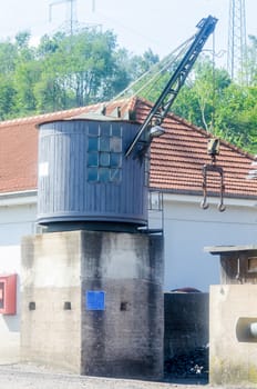 Coal crane for loading of old steam locomotive with coal.