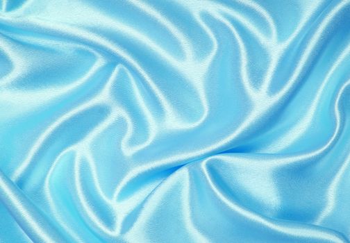 Smooth elegant blue silk or satin can use as background 