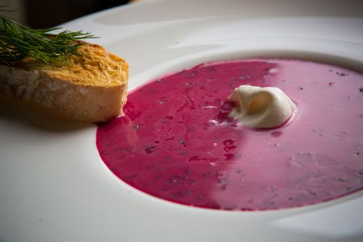 Cold summer Beets soup in white plate