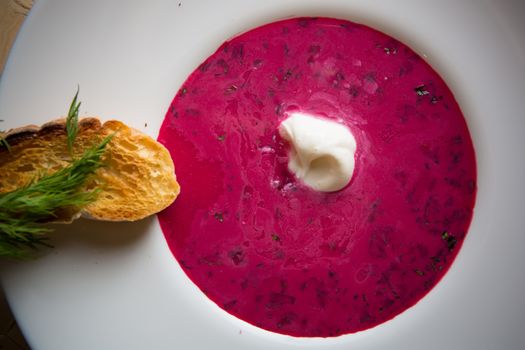 Cold summer Beets soup in white plate