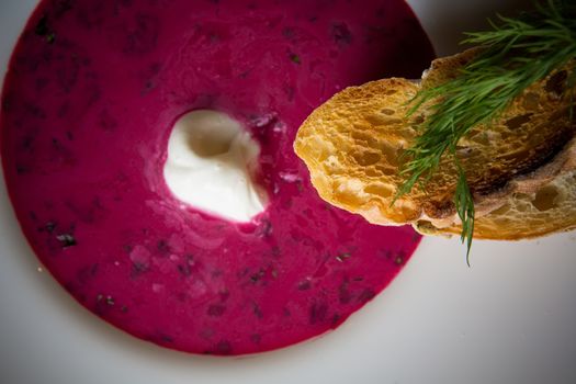 Cold summer Beets soup in white plate