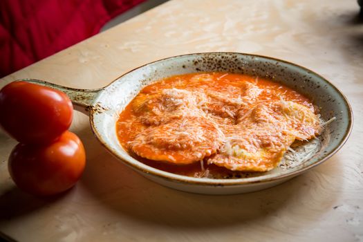 Ravioli in sauce. Lunch. Ravioli Medallions with Marinara Sauce.