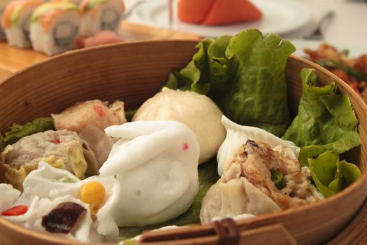 wontons in wooden bowl