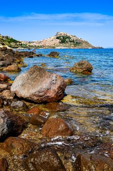 Scenic view of ocean coast and Castelsardo village, Sardinia, Italy