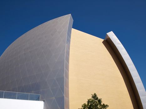 Futuristic modern architecture congress conference center with sky background