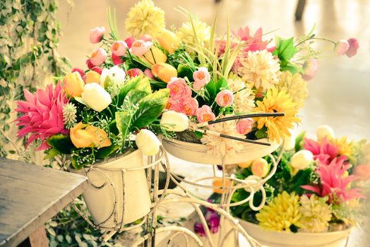 Decoration artificial flower in basket on bicycle