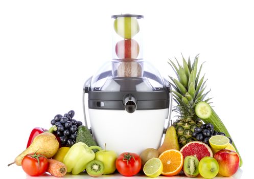 Fruits and vegetables for juice near juicer on white background. Healthy fruits eating and drinking.