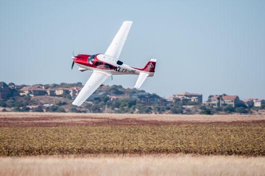 BLOEMFONTEIN, SOUTH AFRICA - MAY 29, 2015: Cirrus SR22 taking off. The 2015 Presidents Trophy Air Race was held at the Tempe Airport from 28 to 30 May 2015. More than 100 light aircraft participated