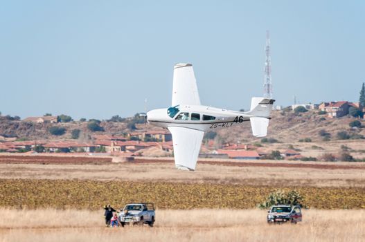 BLOEMFONTEIN, SOUTH AFRICA - MAY 29, 2015: Beechcraft F33A takes off. The Presidents Trophy Air Race was held at the Tempe Airport from 28 to 30 May 2015. More than 100 light aircraft participated