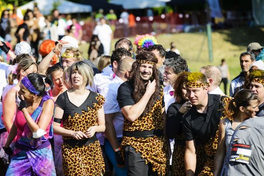 LYON, FRANCE - MAY 24: Crazy group of sportive people all are dressd,  Frappadingue race participating in the event in the Miribel Jonage Park to Lyon on May 24, 2015. People from all walks of life participated in the run.