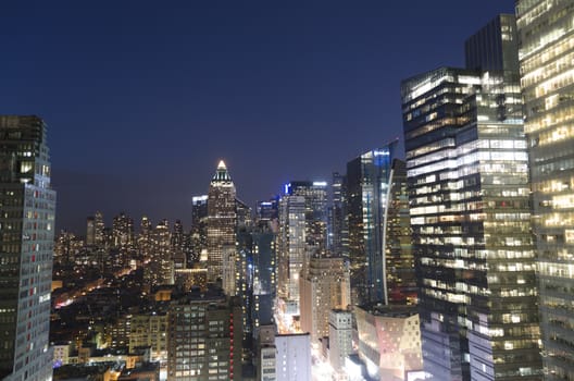 New York by night through buildings