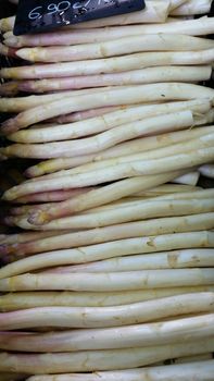 A variety of Fresh White asparagus for sale at a local market. Marché Saint-Antoine Célestins