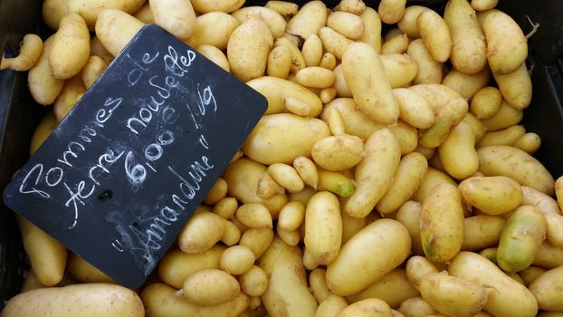 Potatoes for sale in vegetable market of Lyon in France. Marché Saint-Antoine Célestins