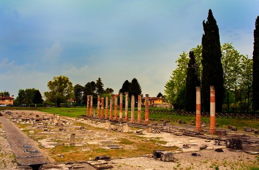 View of columns, Roman ruins on Archeological area of Aquileia in Italy