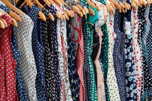 Colorful Rockabilly polka dot dresses on hangers display