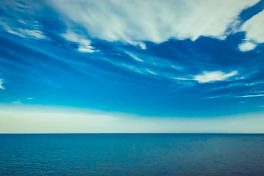 blue sea and clouds on sky