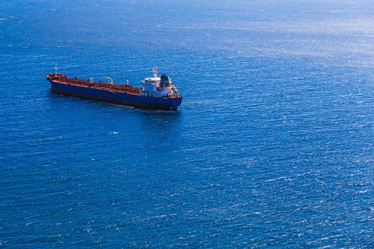 Empty container cargo ship in the open ocean or sea
