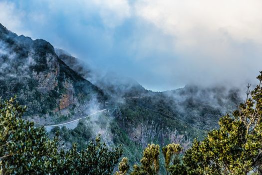 Mountain and clouds over peak landscape with winding road in Tenerife Canary island, Spain