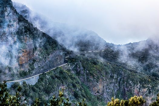 Mountain and clouds over peak landscape with serpantine road in Tenerife Canary island, Spain