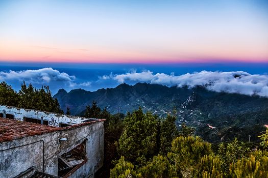 Mountain and clouds landscape with sky horizon and old building in Tenerife Canary island, Spain