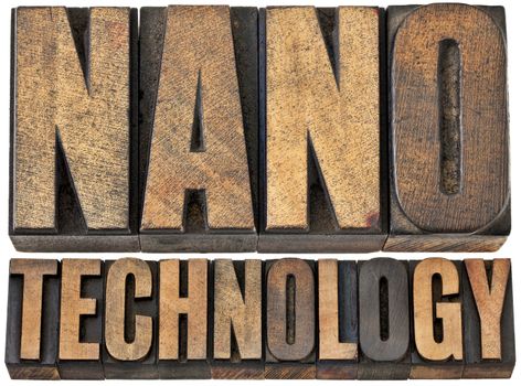 nanotechnology  (manipulating matter on an atomic and molecular scale) -- isolated word abstract in vintage letterpress wood type