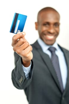 Businessman showing his credit card to camera