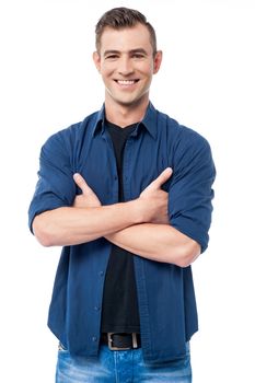 Stylish man posing with arms crossed