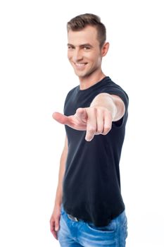 Young male pointing his finger towards camera