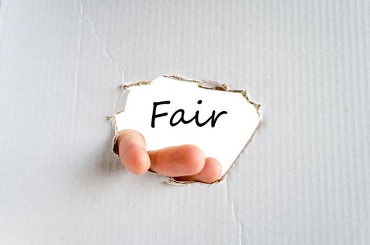 Hand and text on the cardboard background Fair