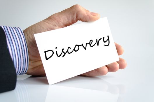 Discovery note in business man hand