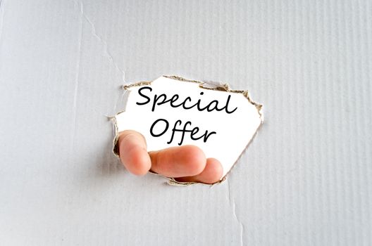 Hand and text on the cardboard background Special offer Concept