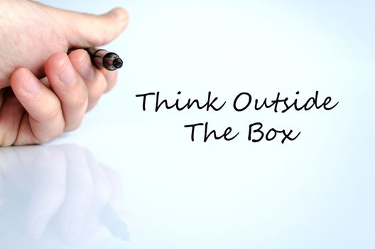 Pen in the hand isolated over white background Think outside the box concept