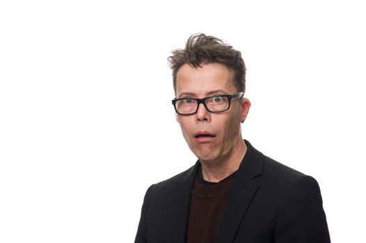 Close up Surprised Middle Age Businessman with Glasses Looking at the Camera in a Funny Facial Expression. Isolated on White Background.