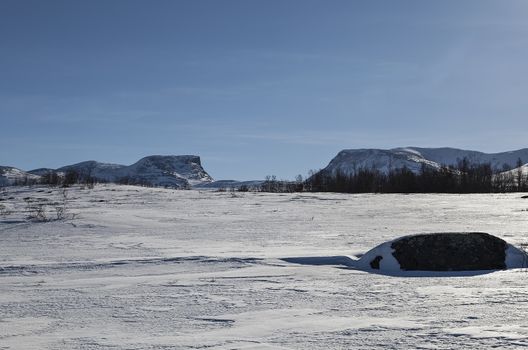 A view at some mountains in a winter wonderland