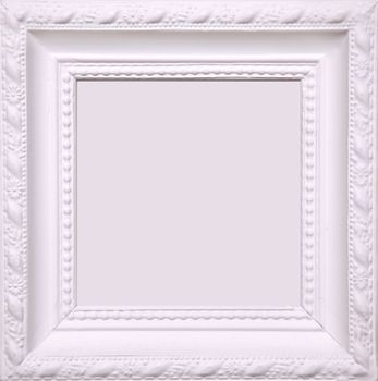Blank white picture frame on wall