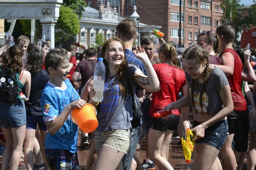 The game "Water Fight" in honor of opening of a summer season on the street in Tyumen. 31.05.2015