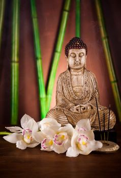 Zen buddha statue, vivid colors, natural tone