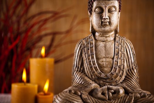 Buddha statue with orchid flower