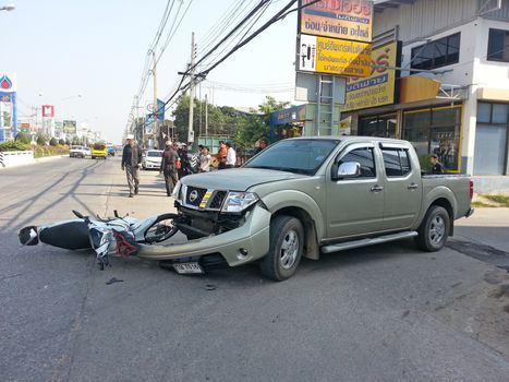 CHIANGMAI, THAILAND-JANUARY 10, 2013: Crash Accident Pickup Truck with Motorcycle at roadside in Chaingmai, Northern Thailand.