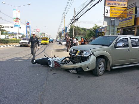 CHIANGMAI, THAILAND-JANUARY 10, 2013: Crash Accident Pickup Truck with Motorcycle at roadside in Chaingmai, Northern Thailand.