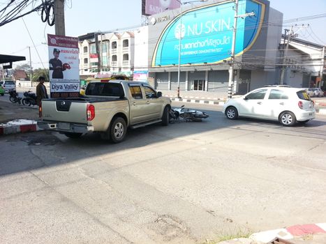 CHIANGMAI, THAILAND-JANUARY 10, 2013: Crash Accident Pickup Truck with Motorcycle at roadside in Chaingmai, Northern Thailand.