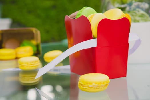 A lot of french colorful macarons. shallow dof