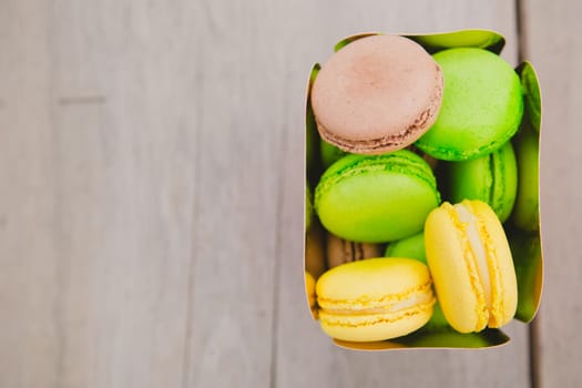 A lot of french colorful macarons. shallow dof