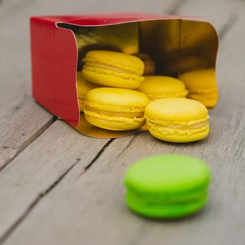 A lot of french colorful macarons. shallow dof