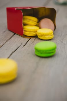 A lot of french colorful macarons. shallow dof