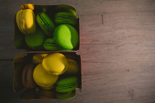 A lot of french colorful macarons. shallow dof