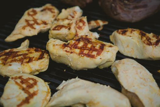 organic meat on the grill. close-up. Shallow DOF.