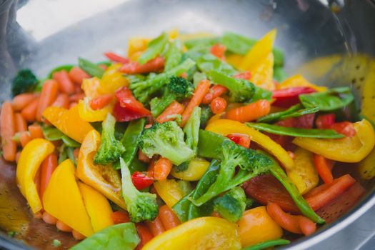 Stir fry vegetables as a background. Shallow dof