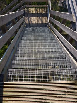 Stairs nature observation tower made of wood and metal     